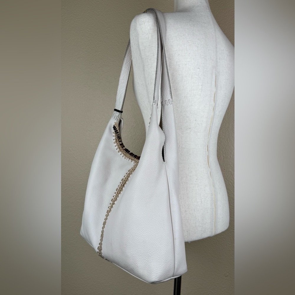 The Sak Huntley Hobo Bag. Ecru.Soft, Pebbled Leather w/Fabric Turquoise Interior - Picture 6 of 16